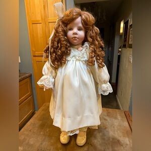 Kelly J Rubert 1999 Johni Porcelain Doll Curly Red Hair 
Numbered 264 of 300